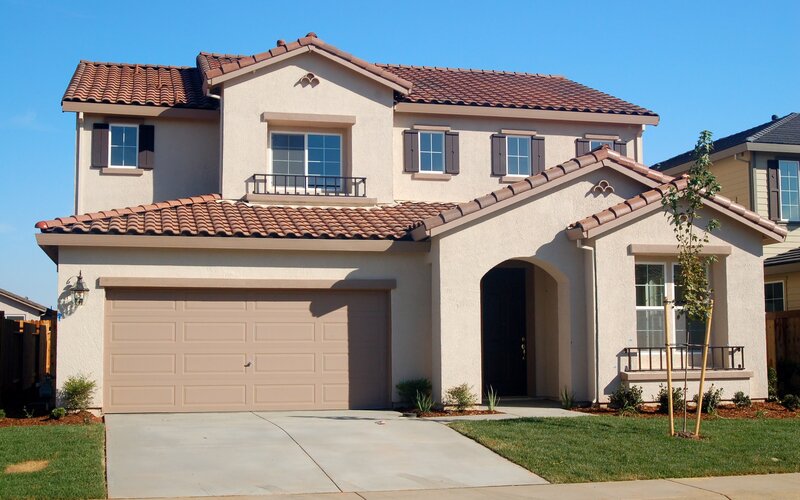 two-story house with tiled roof