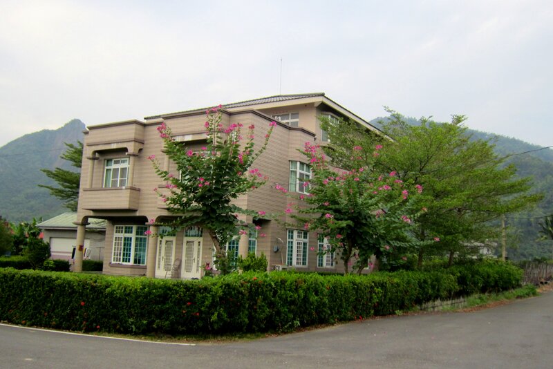 Two-story House with Trees