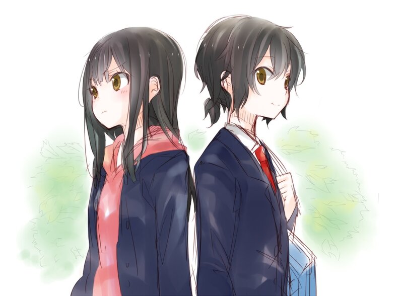 Two Students Standing Back to Back