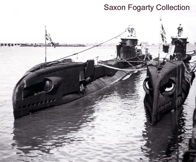 Two submarines in harbor