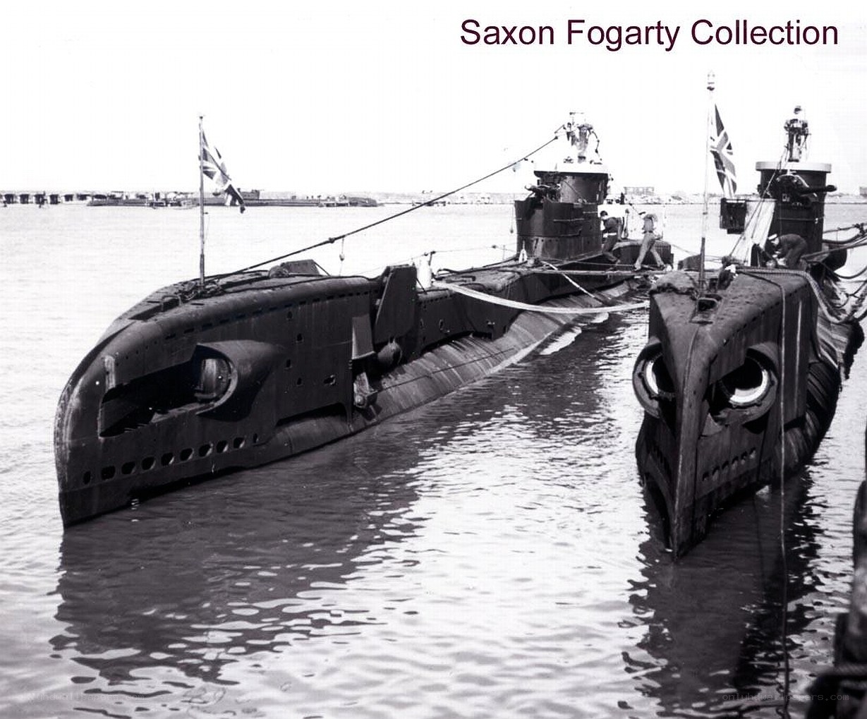 Two submarines in harbor