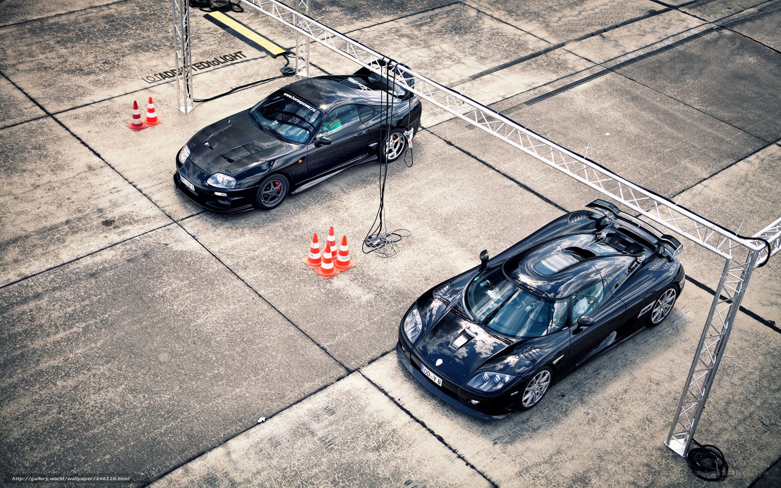 Two Supercars on a Test Track