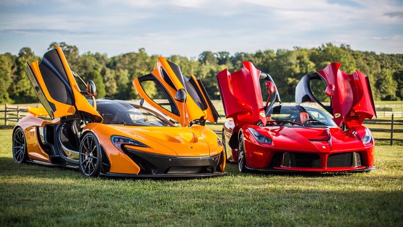 Two Supercars on Grass — Orange