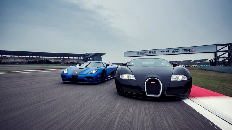 Two Supercars on Track — Black