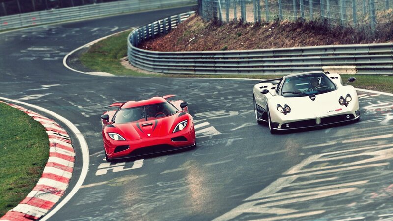 Two Supercars on Track — Red