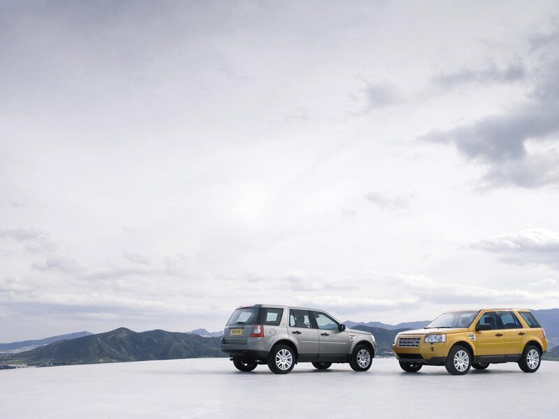 Two SUVs on a plain