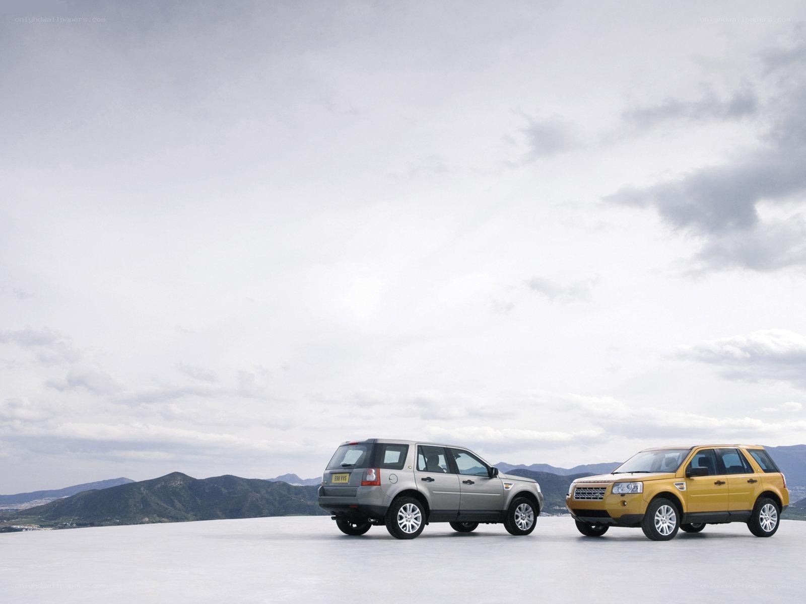 Two SUVs on a plain