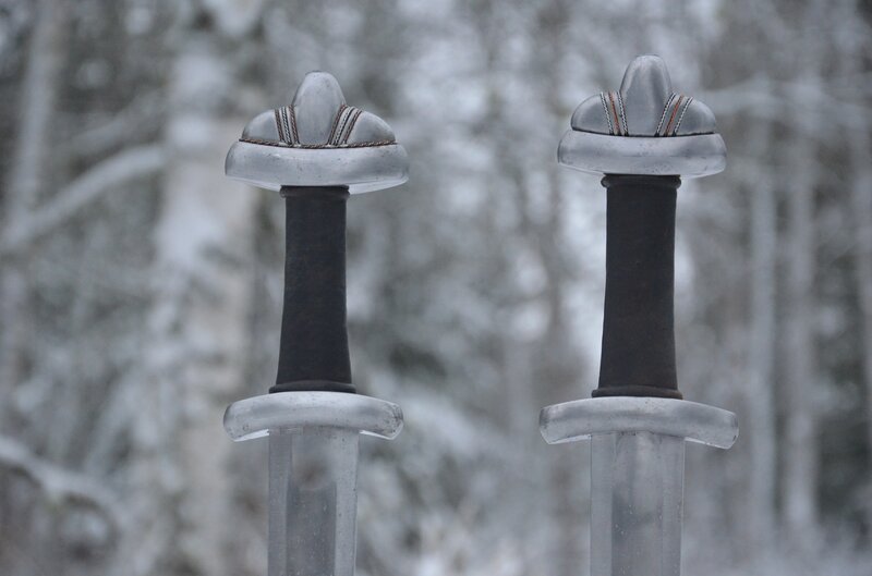Two swords in snowy forest