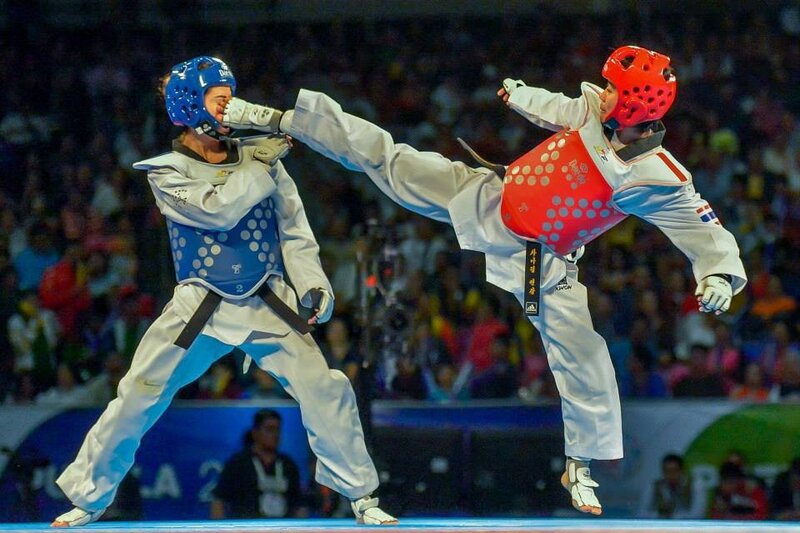 Two Taekwondo Athletes — White