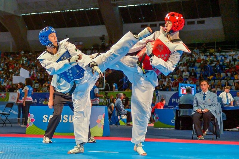 Two Taekwondo Fighters — Blue, Competitive, Night, Photograph