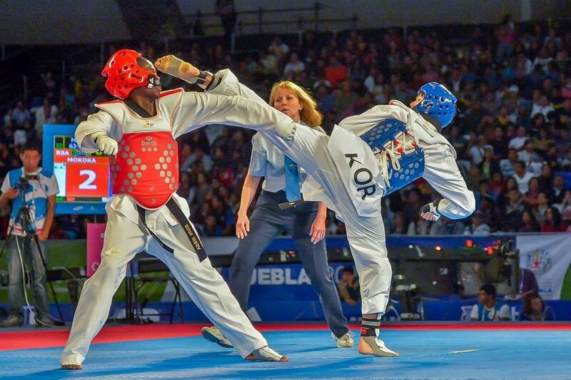 Two Taekwondo Fighters — Blue, Competitive, Photograph