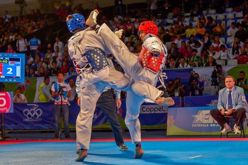 Two Taekwondo Fighters — Blue, Competitive