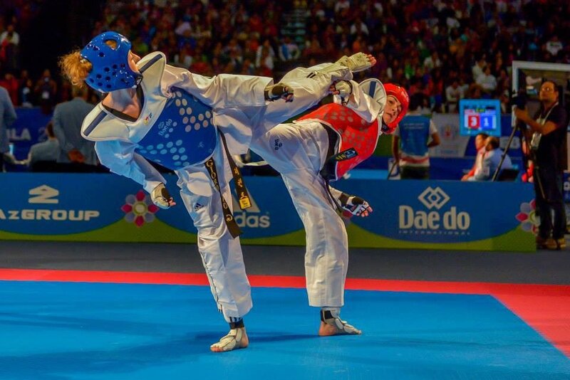Two Taekwondo Fighters — Blue