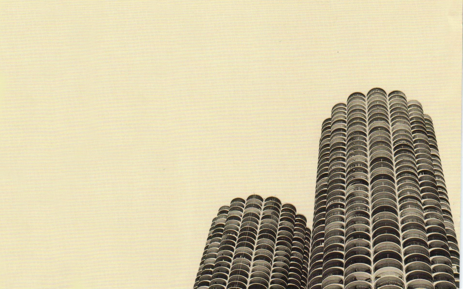 Two tall buildings against sky