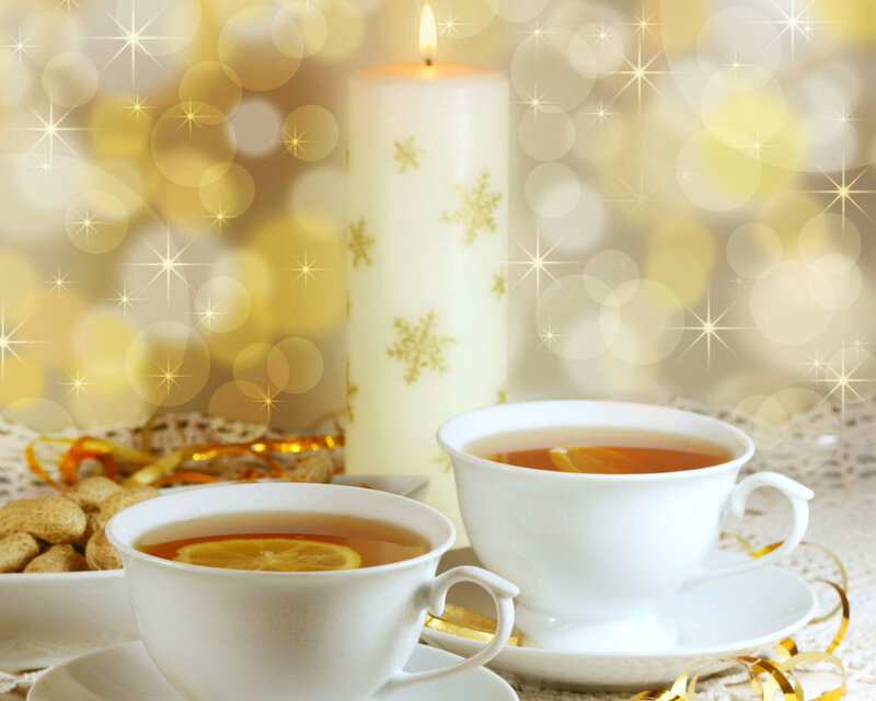 Two Tea Cups with Candle