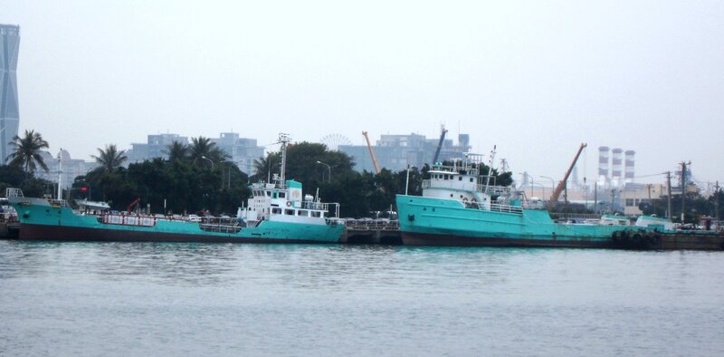 Two Teal Ships at Dock