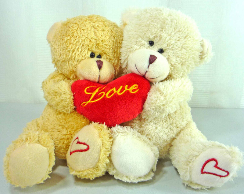 Two Teddy Bears Holding Heart