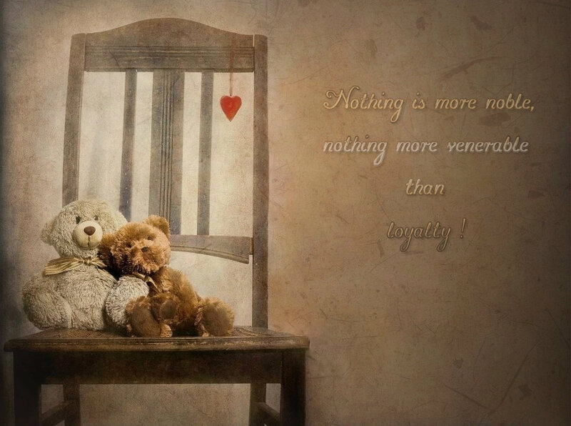 Two Teddy Bears on Chair