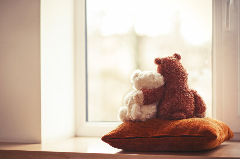 Two Teddy Bears on Pillow