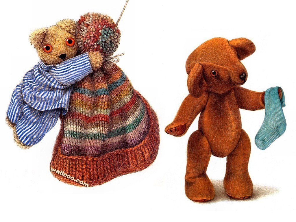 Two teddy bears with clothes
