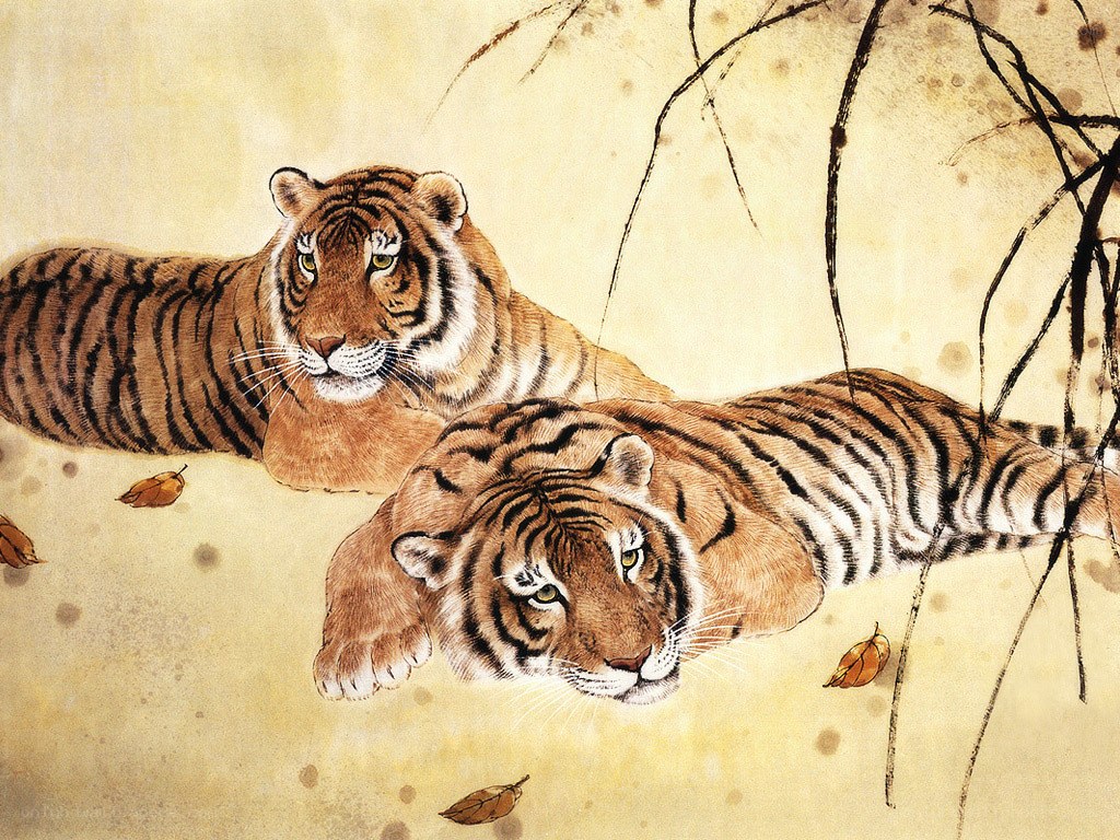 Two tigers resting in autumn