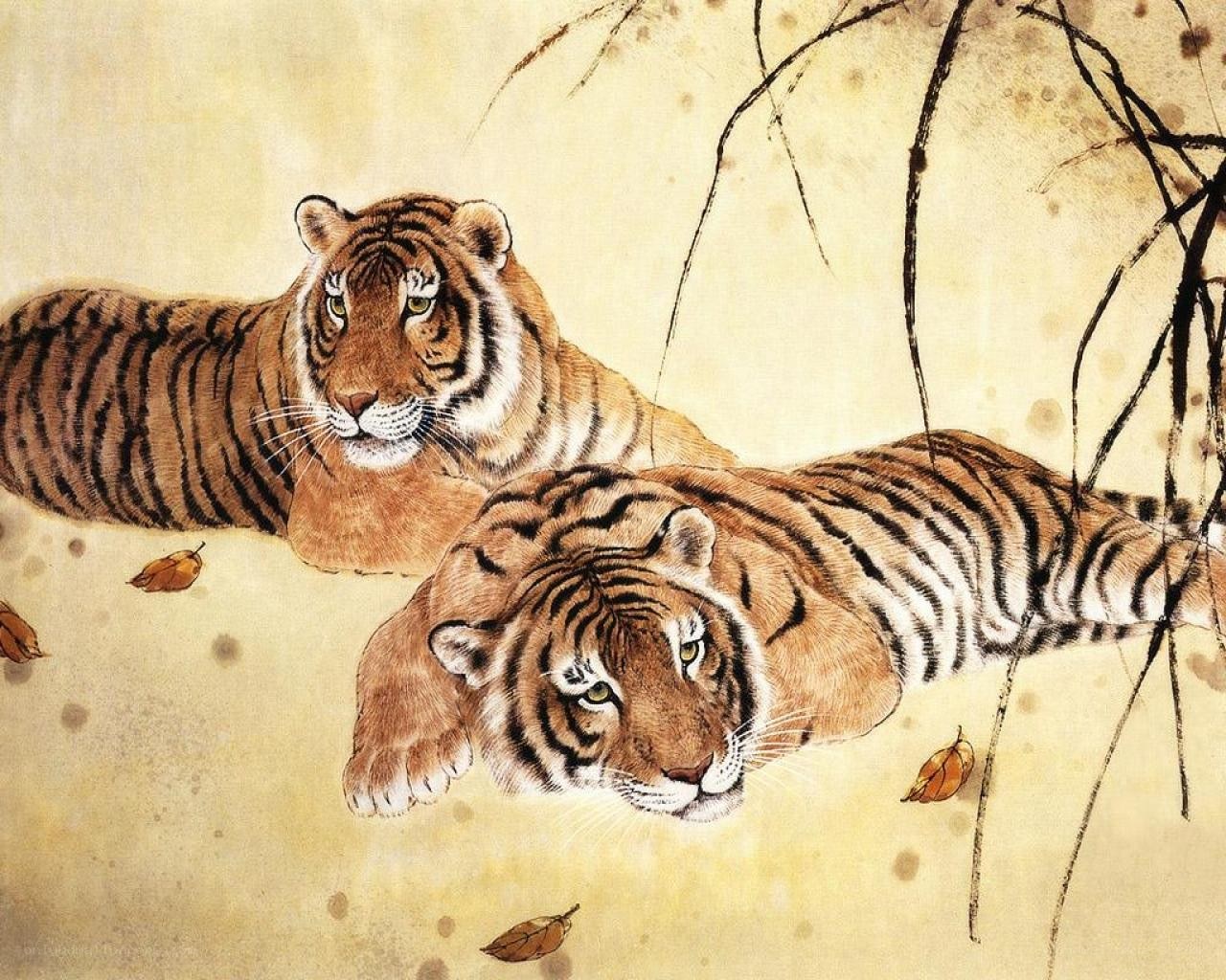 Two tigers resting in autumn