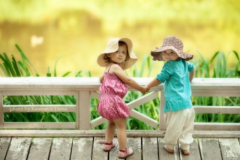 Two Toddlers Holding Hands