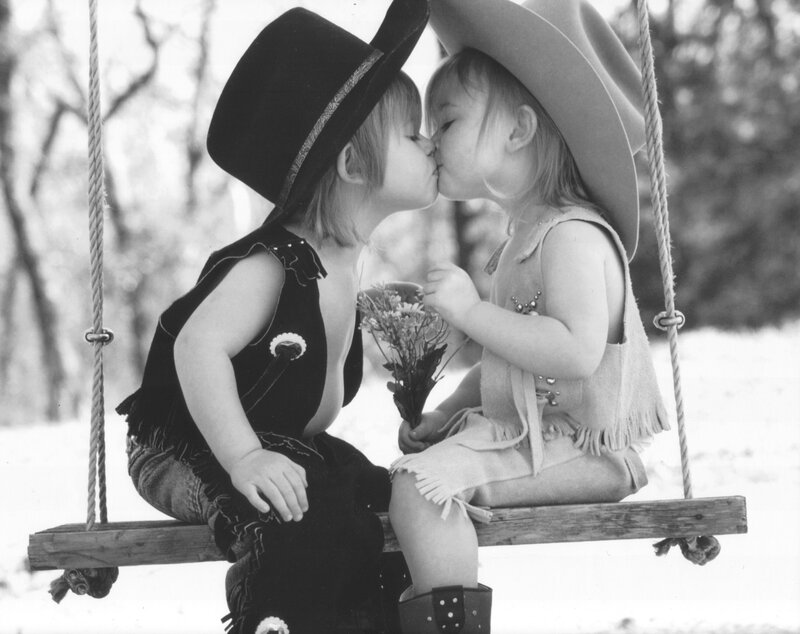 Two Toddlers Kissing
