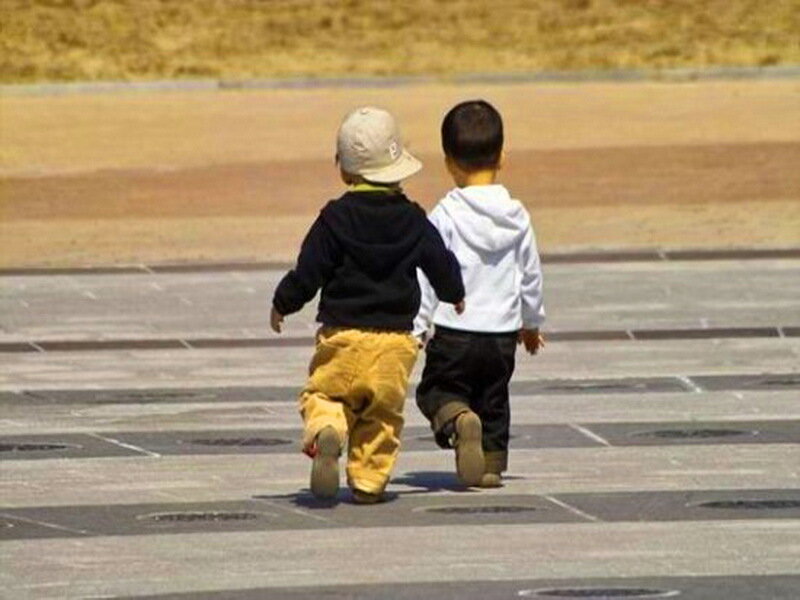 Two Toddlers Walking