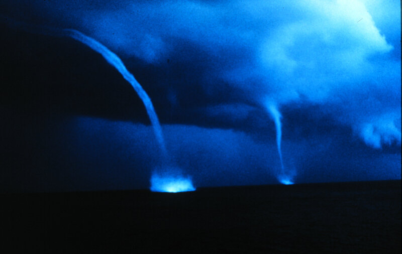 Two tornadoes at night