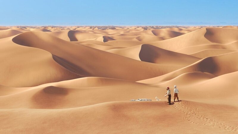 Two travelers in a vast desert