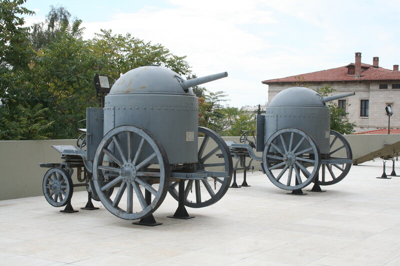 Two vintage armored vehicles on display