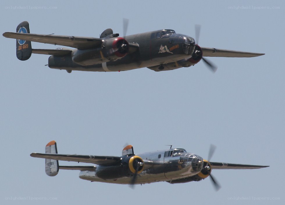 Two vintage bombers in flight