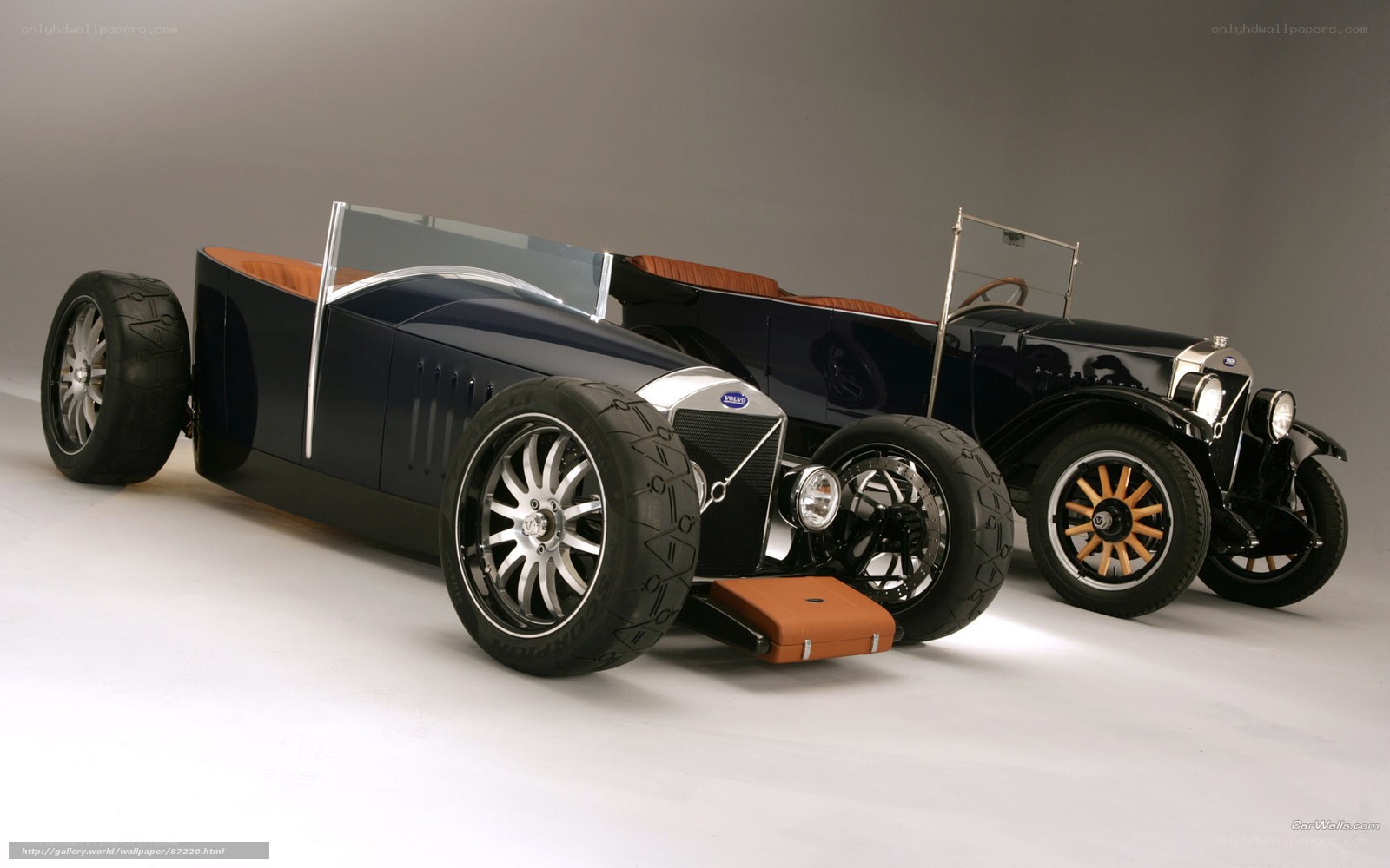 Two vintage cars side by side