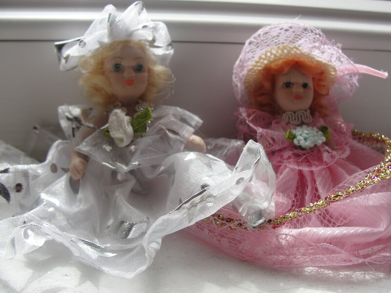 Two vintage dolls in dresses