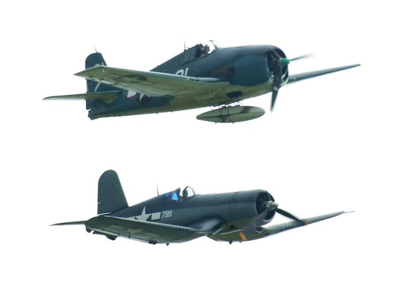 Two vintage military planes in flight