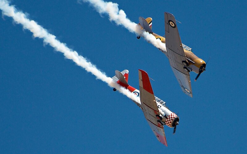 Two Vintage Planes Flying — Blue
