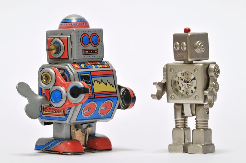 Two vintage toy robots