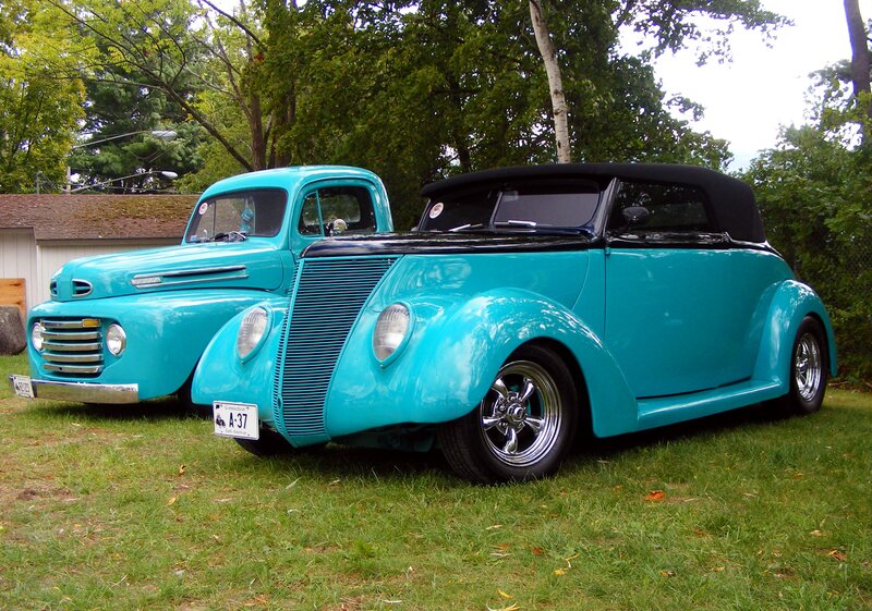 Two Vintage Turquoise Cars