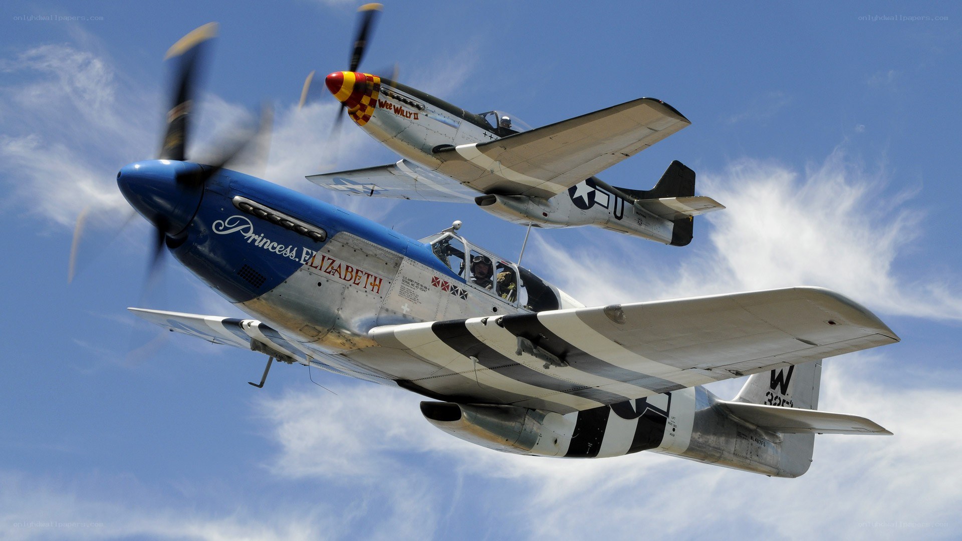 Two vintage warplanes in flight