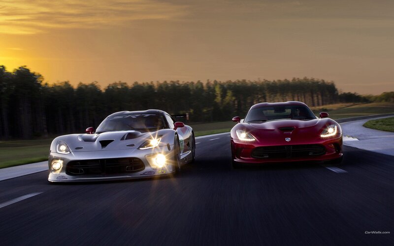 Two Vipers racing at sunset
