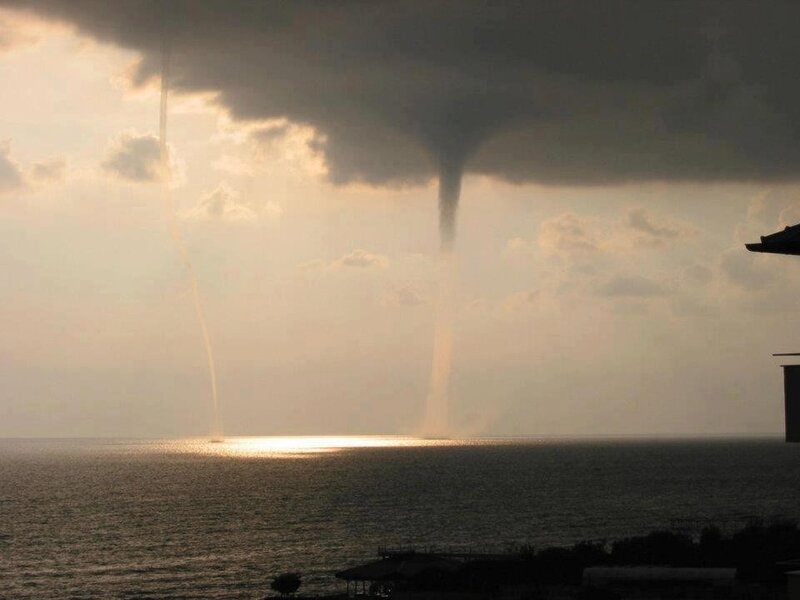 Two Waterspouts over Sea