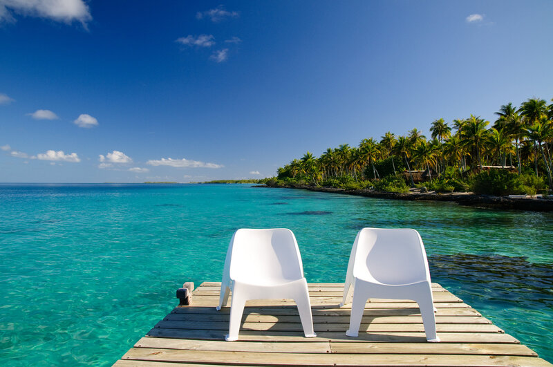 Two White Chairs on Dock