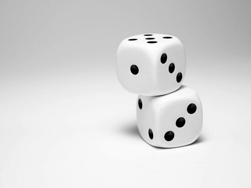 Two white dice stacked