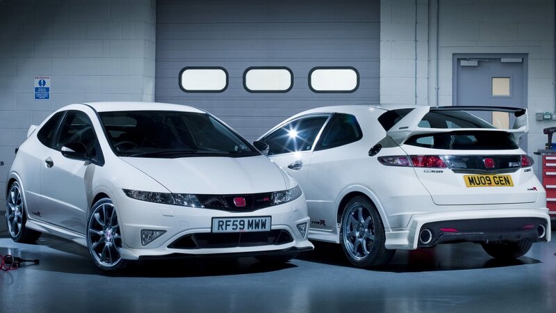 Two white Honda Civic Type R cars