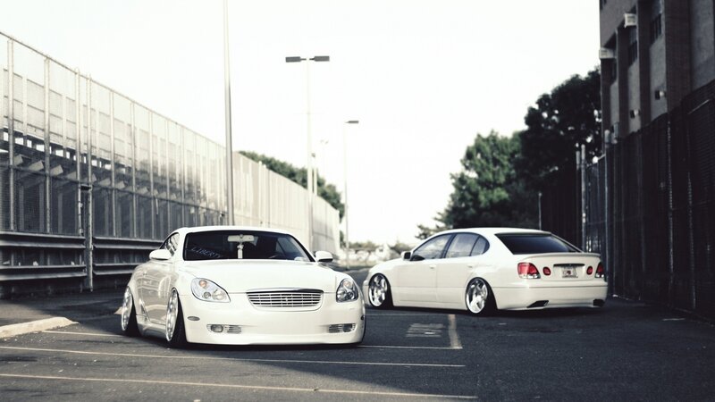 Two White Luxury Cars