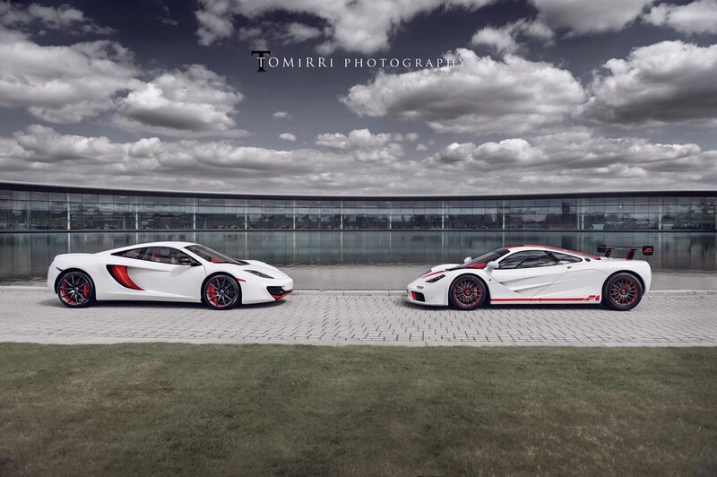 Two white McLaren supercars