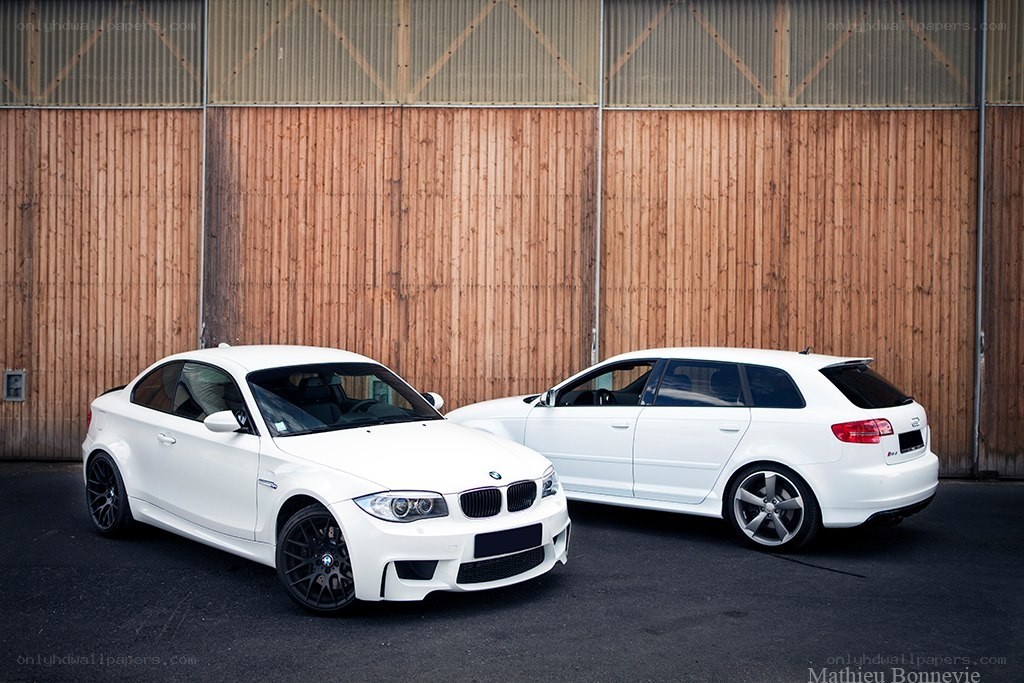 Two white performance cars