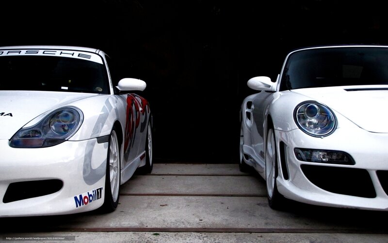 Two white Porsche cars