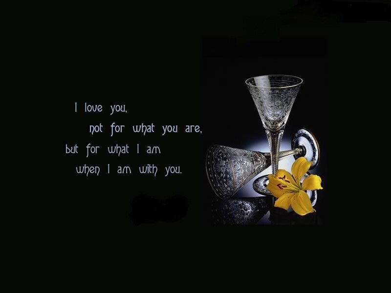 Two Wine Glasses and a Flower
